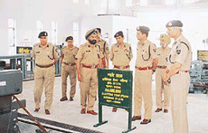 ITBP Director-General, Mr S.C. Chaube (second from right), goes around the base workshop during his visit to the ITBP transport battalion in Chandigarh on Tuesday.