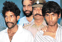 The two murder accused, Raju and 12- year-old Hare Ram along with the police party that nabbed them.