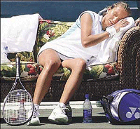 Iva Majoli of Croatia, rests during the second set of her match with Martina Hingis on Thursday at the Family Circle Cup in Charleston, S.C. Majoli was suffering from a cold and she was defeated by Hingis 4-6, 6-2, 6-3.
