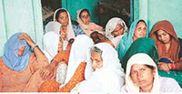 Relatives of Amarjit Singh who was killed on Tuesday at Lohgarh village near Zirakpur.