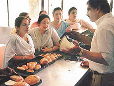 Women attend a workshop on baking at Punjab Agriculture University in Ludhiana.