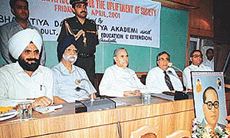 Babu Parmanand, Governor, Haryana (centre), along with Dr Ajaib Singh, Dr K.S. Raju (on his left), and Dr Ashok Sahini at a seminar on �Role of Dr B.R. Ambedkar for Uplift of Society� in the ICSSR complex in Panjab University on Friday. 