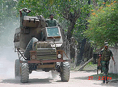 A Sri Lanka Army armoured vehicle moves toward Tamil Tiger rebel-held areas in the Jaffna peninsula, 300 km north of Colombo, on Friday.