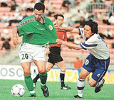 Turkmenistan's Muhammad Kuliev (L) and Taiwan's Chen Jui-Te fight for the ball during an Asian Group 7 World Cup qualifier in Tashkent on Friday. 