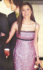Malaysian actress Michelle Yeoh arrives at the 20th Hong Kong Film Awards ceremony on Sunday.