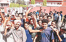 Candidates of the paper of environment studies who were not allowed to appear in the examination  outside DAV College, Sector 10, Chandigarh, on Monday.