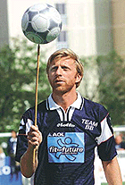 Former German tennis player Boris Becker balances a soccer ball on a stick before a charity soccer match in Mallorca on Monday.