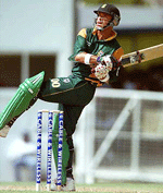 Herschelle Gibbs of South Africa bats during his century, at the second Cable and Wireless one-day international match against West Indies at the Antigua Recreation Grounds in St John�s, Antigua, on Wednesday.