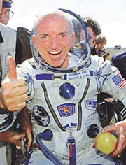 merican multimillionaire Dennis Tito gestures shortly after his landing in the Central Asian steppe, 80 km north-east of Arkalyk, Kazakstan, on Sunday. 