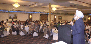 Congress leader Manmohan Singh speaking at a reception orgnised by the Indian National Overseas Congress of the USA, in Queens, New York, on Sunday. 