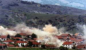 Smoke from shelling covers Vakcince, 40 km northeast of the capital, Skopje, on Tuesday.