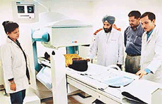 PGI doctors perform a scan after the inauguration of �SPECT Gamma Camera� at the Nuclear Medicine Department at the institution in Chandigarh on Wednesday.