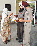 A 100-year-old woman, Gurdev Kaur, explains her case to the officials of the Sainik Welfare Board at the weekly sangat darshan in Ludhiana on Thursday.