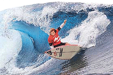 Association of Surfing Professionals world No 5 Heather Clark, of Port Shepstone, South Africa, surfs to victory in her round one heat at the Billabong Pro competition at Teahupoo, Tahiti, on Thursday, advancing into the next round. The Billabong Pro is the second Association of Surfing Professionals world championship tour event of the 2001 season, and features the top 44 men surfers and top 16 women surfers in the world. 