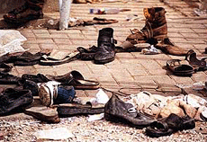 Footwear left behind by those trying to escape the stampede at the Accra stadium is seen on Thursday. Ghana�s government has announced a three-day mourning period, and the police have sealed off Accra�s main stadium following a stampede during a soccer match in the Accra Stadium on Wednesday. 