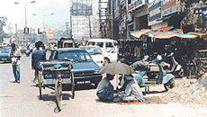 A view of the illegally occupied lane on the other side of the G.T. Road in Ludhiana on Friday.