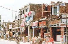 Encroachments by shopkeepers on the road to Khuda Ali Sher through Nayagaon behind Punjab Engineering College, Chandigarh.