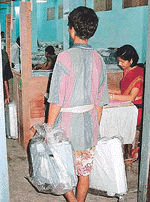 Electronic voting machines being kept in safe custody pending counting after the polling in Guwahati on Thursday night.