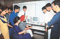 A team of Government College Sector-46 students, with their principal, at the launch of the college website in Chandigarh on Saturday. 
