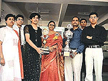 Nikhita Sood receives the Best All-Rounder Award at the annual prize distribution of KVM in Ludhiana on Saturday. 