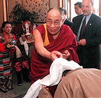 Members of the Tibetan community of Salt Lake City greet the Dalai Lama at the Holy Greek Orthodox Church in Salt Lake City, on Saturday.