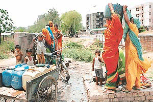 Labourers involved in construction of buildings and laying of water pipelines are forced to sweat it out each morning in search of water.