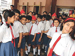 School students outside a cinema hall in Ludhiana on Tuesday, after watching one of the movies of the Children�s Film Festival. 