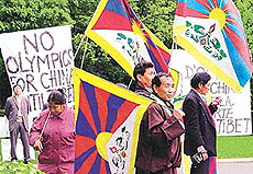 Tibetan exiles demonstrate against Beijing�s bid for the 2008 Olympics outside the International Olympic Committee�s (IOC) headquarters on Tuesday in Lausanne. 