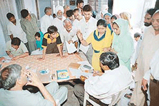 Officials of the Electricity Department redress grievances of residents of Ramgarh at an open darbar held at Ramgarh on Wednesday. 