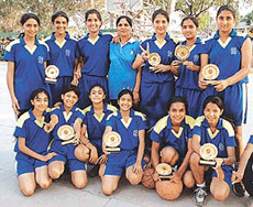The team of IS Dev Samaj Girls Senior Secondary School, Sector 21, after winning the UT Junior Basketball Tournament in Chandigarh on Saturday. 