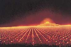 Candlelit procession of devotees moving towards the Dhammakaya Stupa