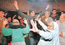 Punjabi pop singer Babbu Mann dances with old persons to celebrate New Year at Old Age Home, Sector 15, Chandigarh, on Monday.