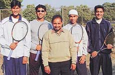 Members of the lawn tennis team of GGDSD College, Sector 32, Chandigarh, after winning the inter-college lawn tennis championship on Friday. 