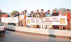 Members of the Bharatiya Janata Yuva Morcha organise a �raksha sankalp abhiyan� to awaken the public against terrorism, in Chandigarh on Friday. 