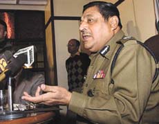 Delhi Police Commissioner Ajay Raj Sharma at a press conference in the Capital on Friday.
