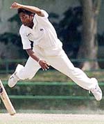 Sri Lanka's Charitha Buddhika bowls against Zimbabwe 