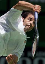 Pete Sampras of the U.S serves during his first round match