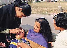 Polio drops being administered in Sector 46 on Pulse Polio immunisation day in Chandigarh on Sunday.