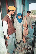 A resident points out at a blood-soaked shawl in a house where robbers struck in the wee hours of Sunday at Dashmesh Nagar, Kharar.