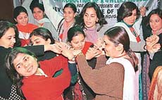 Girls participate in a workshop on �Innovative Teaching Methods� at the Dev Samaj College for Girls, Sector 36, in Chandigarh on Monday. 