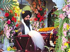 A bedecked interior of a gurdwara on the birth anniversary of Guru Gobind Singh.