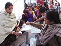 Sweet sherbat being offered to devotees on the occasion of Guru Gobind Singh�s birth anniversary in the Capital on Monday.