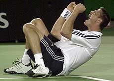 Marat Safin of Russia celebrates winning his fourth round match