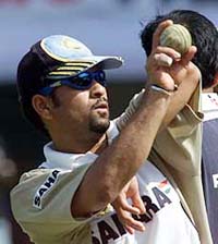 Sachin Tendulkar bowls during the practice session