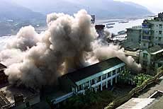 Chinese engineers blow up the township government building