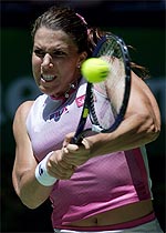 Jennifer Capriati makes a backhand return during her quarterfinal win over France's Amelie Mauresmo at the Australian Open on Wednesday
