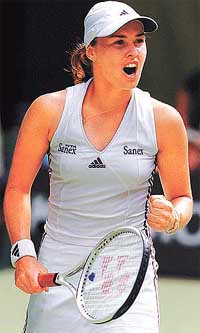  Martina Hingis celebrates during her semifinal against Monica Seles