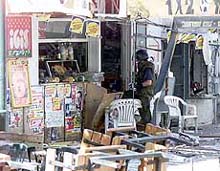 Israeli police attend the scene