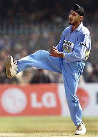 Harbhajan Singh celebrates after claiming the wicket