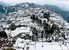 A bird's eye view of hill station Mussoorie in Uttaranchal after snowfall 